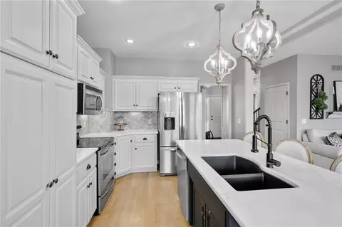 Kitchen - 1303 Ashdown Cir, Raymore, MO 64083 photo 2 of 3