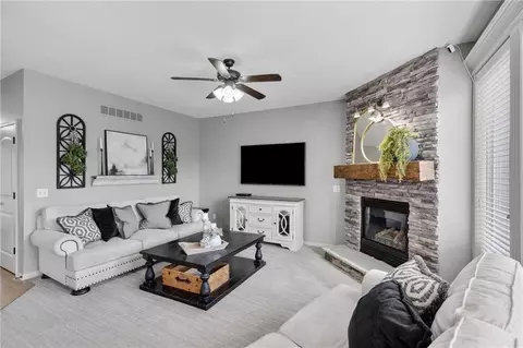 Living - 1303 Ashdown Cir, Raymore, MO 64083 photo 3 of 5