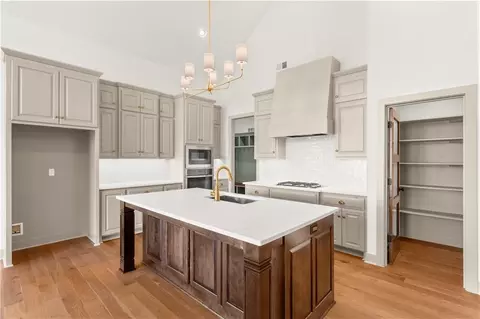 Kitchen - 1628 Hanover Ln, Raymore, MO 64083 photo 3 of 6