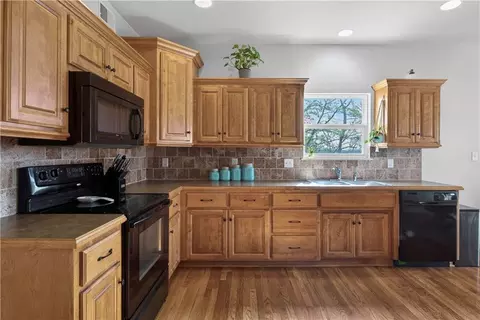 Kitchen - 111 E Timberlake Dr, Lone Jack, MO 64070 photo 2 of 2
