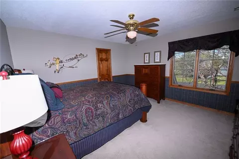 Bedroom - 304 Reavley Dr, Lamar, MO 64759 photo 5 of 11