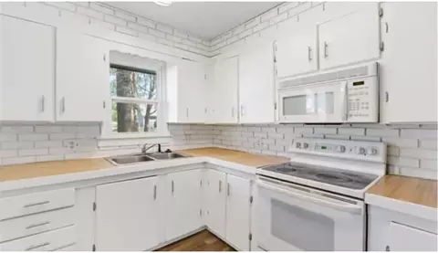 Kitchen - 311 E Hatten St, Drexel, MO 64742 photo 2 of 3