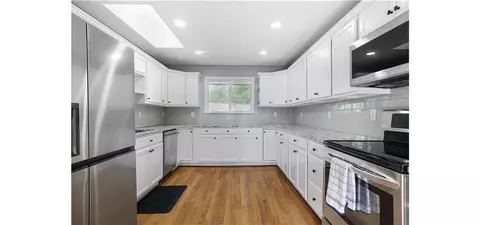 Kitchen - 700 Lark St, Raymore, MO 64083 photo 2 of 4