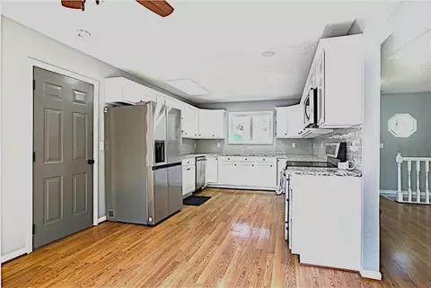 Kitchen - 700 Lark St, Raymore, MO 64083 photo 1 of 4