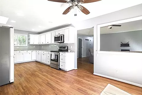 Kitchen - 700 Lark St, Raymore, MO 64083 photo 3 of 4