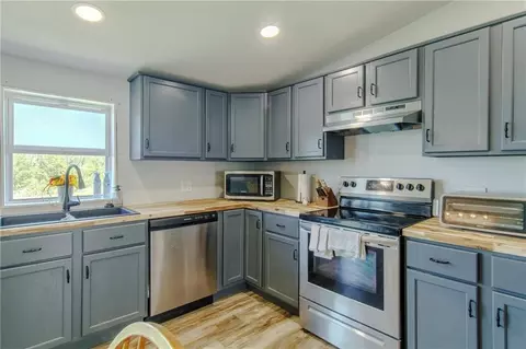 Kitchen - 10064 State Route T Hwy Hwy, Adrian, MO 64720 photo 2 of 2