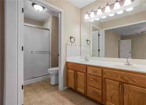 Bath - 1102 Bristol Dr, Raymore, MO 64083 photo 2 of 2