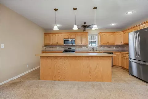 Kitchen - 1102 Bristol Dr, Raymore, MO 64083 photo 1 of 2