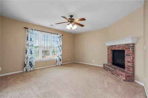 Living - 1102 Bristol Dr, Raymore, MO 64083 photo 5 of 7