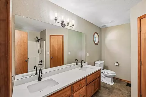 Bath - 204 E 8th St, Adrian, MO 64720 photo 1 of 2