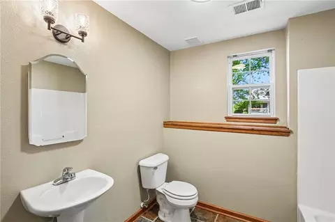 Bath - 204 E 8th St, Adrian, MO 64720 photo 2 of 2