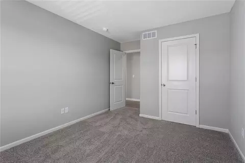 Bedroom - 602 Wild Lupine Ln, Raymore, MO 64083 photo 6 of 8
