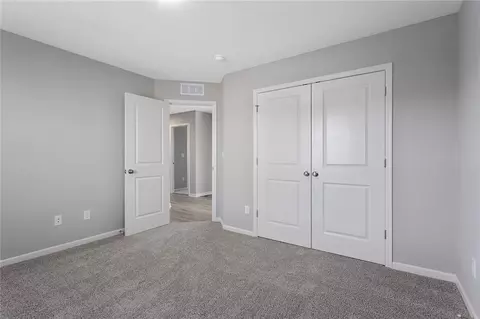 Bedroom - 602 Wild Lupine Ln, Raymore, MO 64083 photo 8 of 8