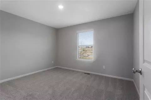 Bedroom - 602 Wild Lupine Ln, Raymore, MO 64083 photo 7 of 8