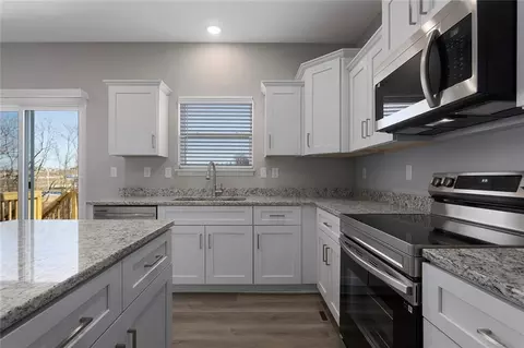 Kitchen - 602 Wild Lupine Ln, Raymore, MO 64083 photo 2 of 2