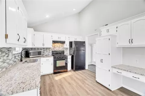 Kitchen - 100 N Darrowby Dr, Raymore, MO 64083 photo 1 of 3
