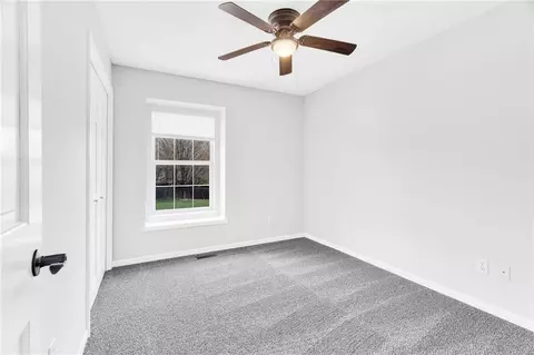 Bedroom - 100 N Darrowby Dr, Raymore, MO 64083 photo 3 of 6