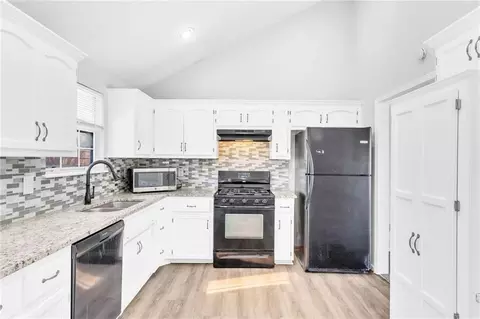 Kitchen - 100 N Darrowby Dr, Raymore, MO 64083 photo 3 of 3