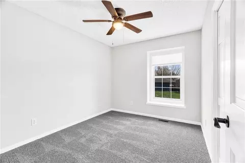 Bedroom - 100 N Darrowby Dr, Raymore, MO 64083 photo 6 of 6