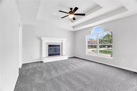 Living - 100 N Darrowby Dr, Raymore, MO 64083 photo 2 of 3