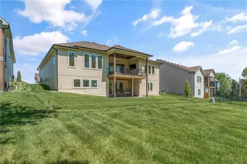 Exterior - 4316 NE Hideaway Dr, Lees Summit, MO 64064 photo 6 of 10