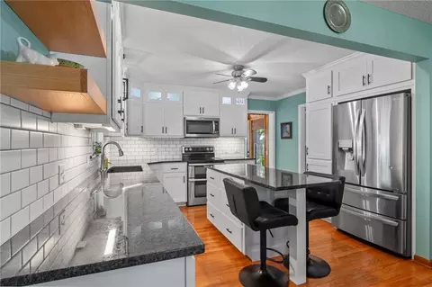 Kitchen - 701 Benjamin Ave, Gower, MO 64454 photo 1 of 3