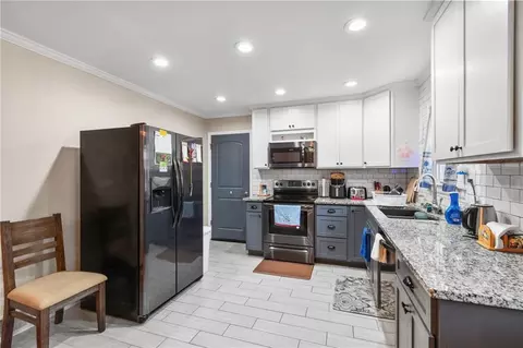 Kitchen - 200 E 5th St, Norborne, MO 64668 photo 2 of 3