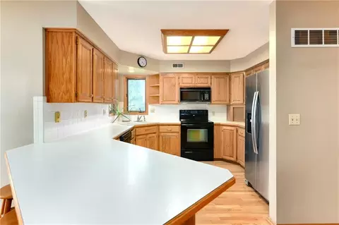 Kitchen - 917 NW Winterset St, Lees Summit, MO 64081 photo 3 of 4