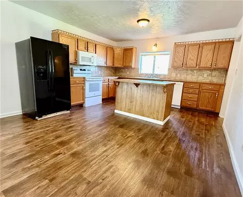 Kitchen - 219 N Tower St, Nevada, MO 64772 photo 2 of 4