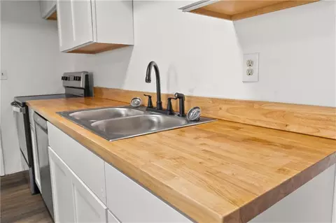 Kitchen - 417 Jackson St, Warrensburg, MO 64093 photo 2 of 3