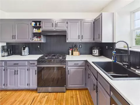 Kitchen - 719 Brookside Dr, Warrensburg, MO 64093 photo 5 of 6