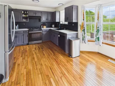 Kitchen - 719 Brookside Dr, Warrensburg, MO 64093 photo 3 of 6