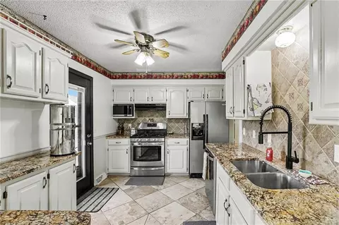 Kitchen - 300 E Casey Rd, Lone Jack, MO 64070 photo 1 of 2