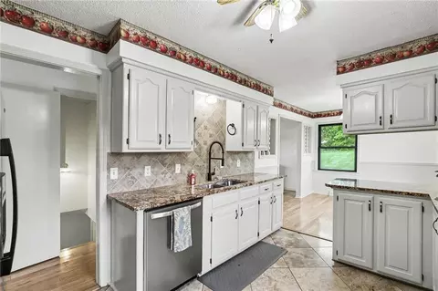 Kitchen - 300 E Casey Rd, Lone Jack, MO 64070 photo 2 of 2
