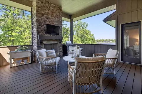 Exterior - 1406 Kenton Ln, Raymore, MO 64083 photo 5 of 12