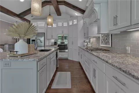 Kitchen - 1406 Kenton Ln, Raymore, MO 64083 photo 5 of 8