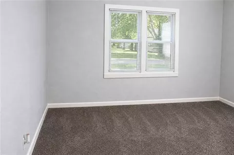 Bedroom - 317 E Pine St, Drexel, MO 64742 photo 2 of 2