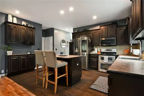 Kitchen - 712 S Adams St, Raymore, MO 64083 photo 3 of 5