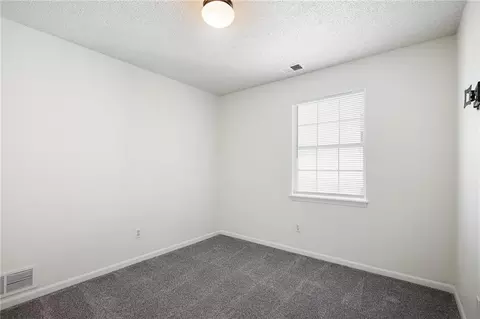 Bedroom - 4612 NE Whispering Winds Dr #A, Lees Summit, MO 64064 photo 4 of 4