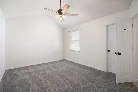 Bedroom - 4612 NE Whispering Winds Dr #A, Lees Summit, MO 64064 photo 3 of 4
