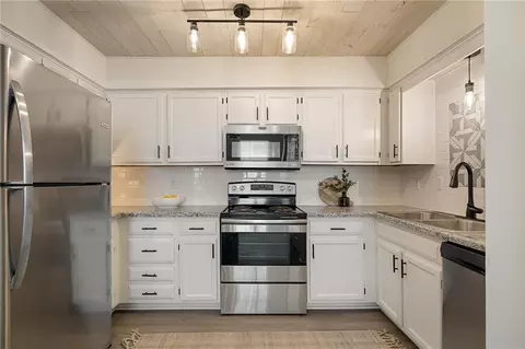 Kitchen - 4612 NE Whispering Winds Dr #A, Lees Summit, MO 64064 photo 1 of 4