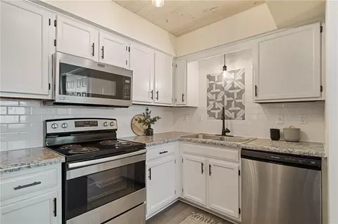 Kitchen - 4612 NE Whispering Winds Dr #A, Lees Summit, MO 64064 photo 2 of 4