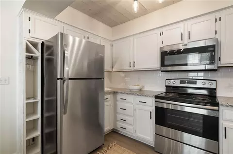 Kitchen - 4612 NE Whispering Winds Dr #A, Lees Summit, MO 64064 photo 3 of 4