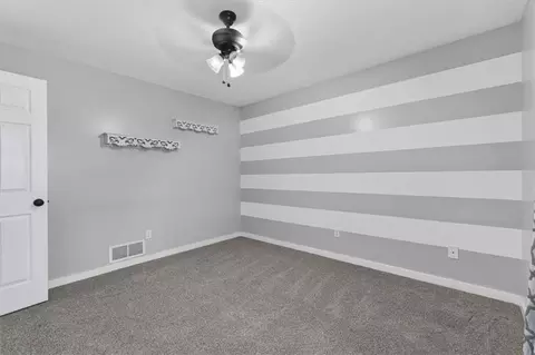 Bedroom - 908 NE Michael Dr, Lees Summit, MO 64086 photo 9 of 11