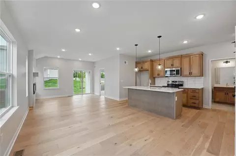 Living - 716 Glenn Cir, Raymore, MO 64083 photo 2 of 3