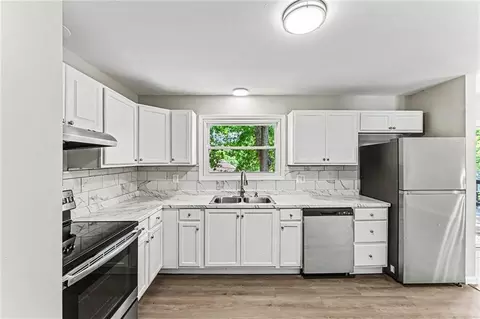 Kitchen - 9309 E 82nd Ter, Raytown, MO 64138 photo 1 of 2