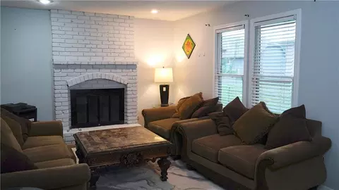 Living - 1828 E Mohawk Dr, Olathe, KS 66062 photo 2 of 3