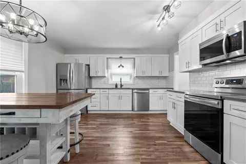 Kitchen - 410 SE Richardson Pl, Lees Summit, MO 64063 photo 1 of 4