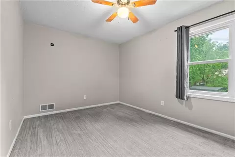 Bedroom - 410 SE Richardson Pl, Lees Summit, MO 64063 photo 2 of 7