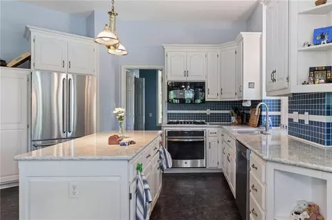 Kitchen - 11709 E 71st Ct, Raytown, MO 64133 photo 3 of 8
